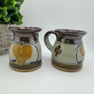 Pair of George Young pottery mugs